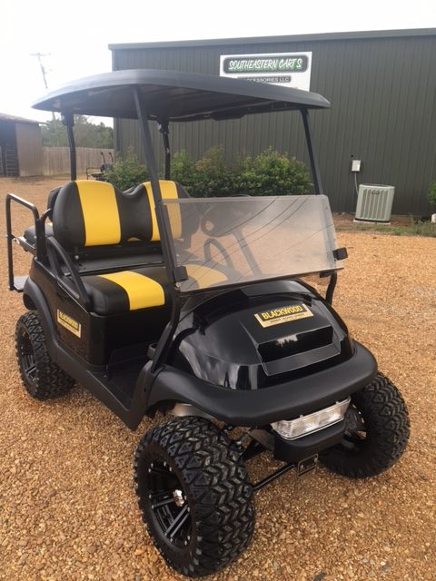 Custom striped yellow and black golf cart seats